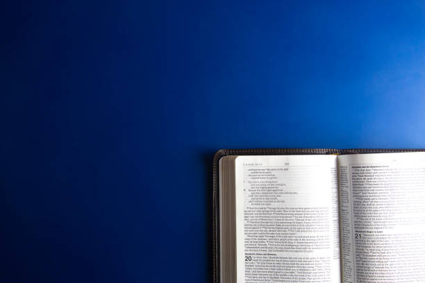 istock A Single Bible Open on an a Blue Background 1142514174