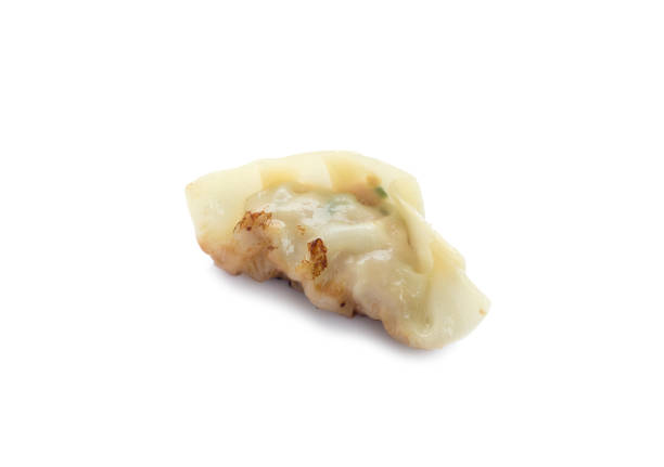 istock fried dumplings or gyoza isolated on white background 1142514482
