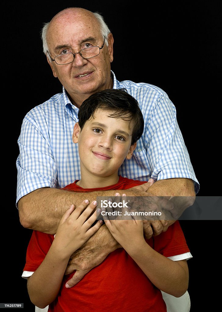 Kaukaski stojący z jego Wnuk - Zbiór zdjęć royalty-free (Dziadek)