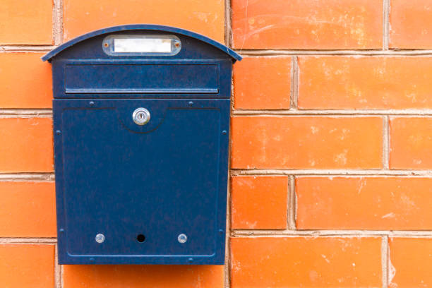 istock A beautiful mailbox hangs waiting for newspapers, parcels and letters. 1142522545