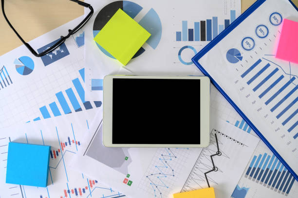istock research documents with analytics data Brainstorm Meeting Businessman financial report 1142526038