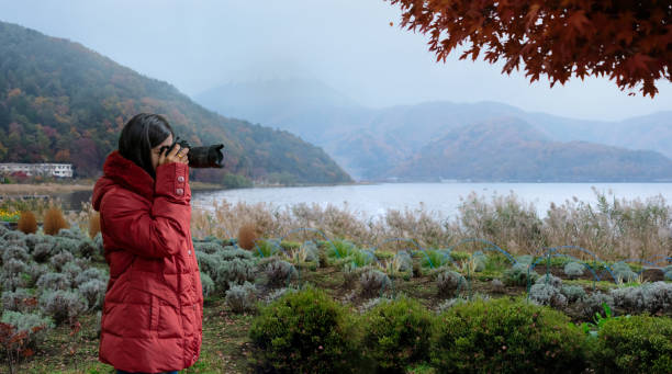 istock Photographer taking photo on morning 1142526935