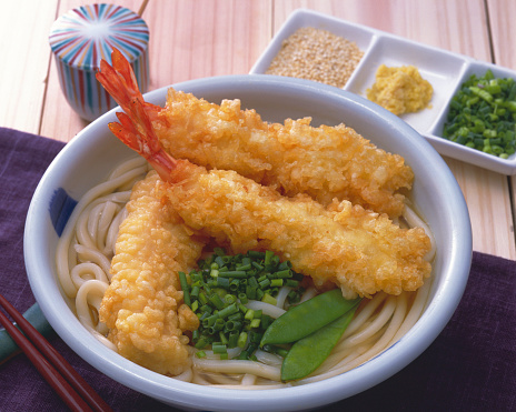 Tempura udon is a dish that plays tempura on typical noodle dish udon in Japan.