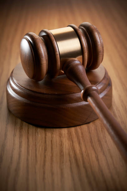istock Gavel on wood with sound block. 1142528261