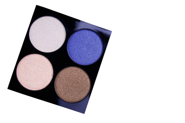 istock Set of four round eye shadow in a plastic black box isolated on white background 1142532717