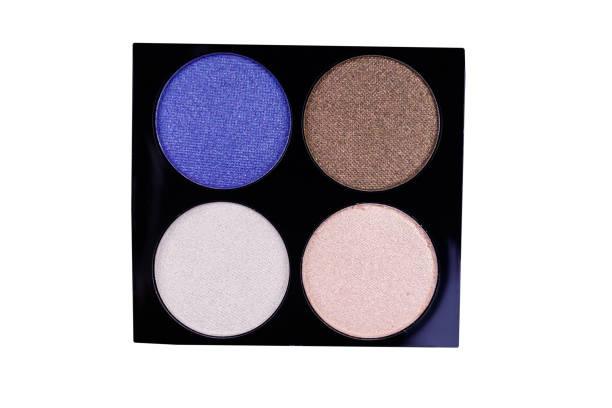 istock Set of four round eye shadow in a plastic black box isolated on white background 1142532720