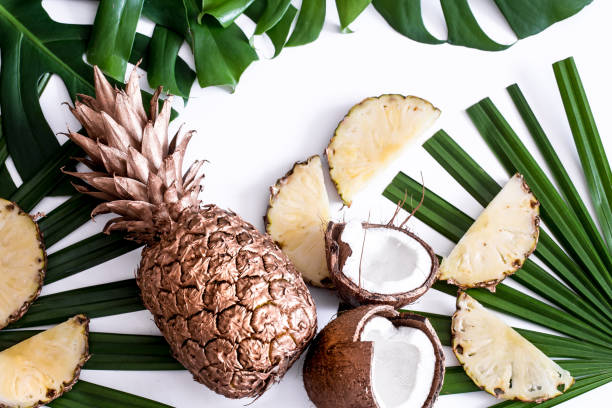 istock summer composition with tropical leaves and fruits on white background 1142532770