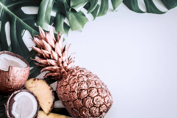 istock summer composition with tropical leaves and fruits on white background 1142532772