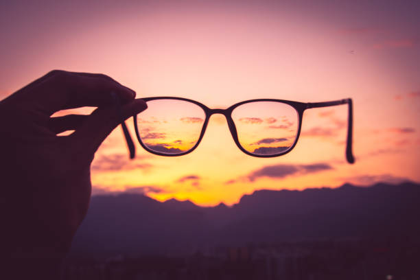 istock Looking city sunset through eyeglass 1142534598
