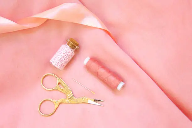 Photo of Sewing accessories in one color pink or coral
