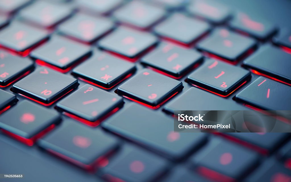 Laptop With Red Backlit Keyboard Modern Red Backlit Keyboard Concept Computer Background Stock Photo