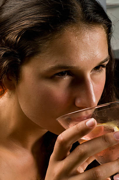 istock Young girl having a Cosmopolitan Cocktail 114253779