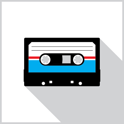 Vector illustration of red,white and blue cassette tape with a shadow on a white background with a gray border.