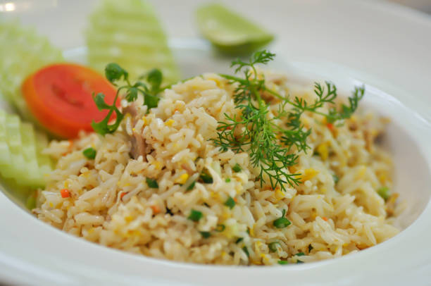 istock stir-fried rice with pork and vegetable 1142539093