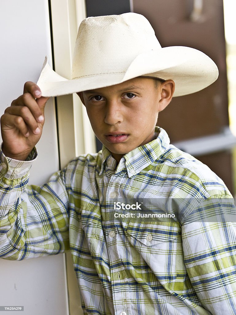 Jovem Vaqueiro - Foto de stock de Chapéu de Cowboy royalty-free