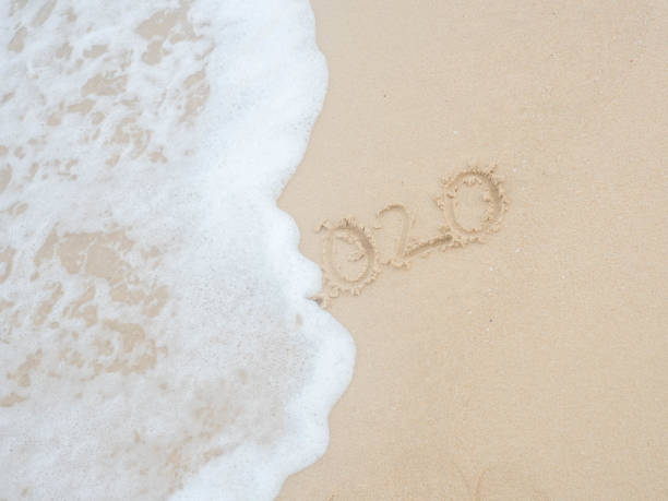 istock water foam and sea wave on the beach 1142545592