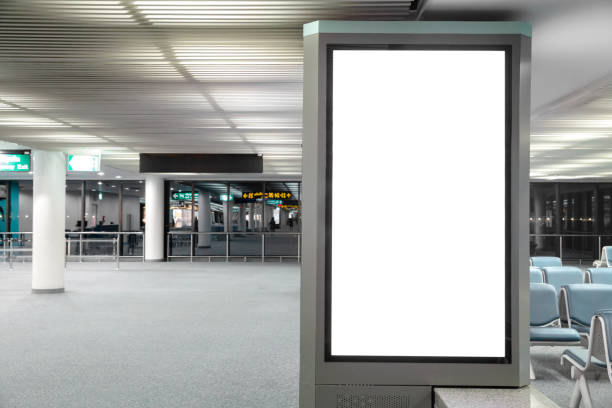 Digital Media Blank billboard in the airport and background blur , signboard for product advertisement design stock photo