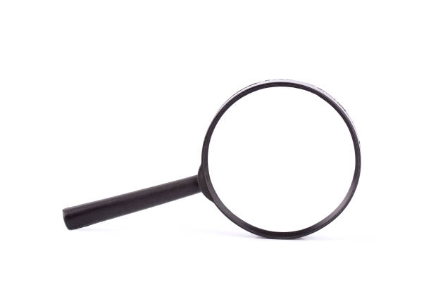 istock Magnifying glass isolated on white background 1142547165