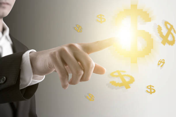 istock Businessman touching on dollar symbol data displaying international success 1142547422