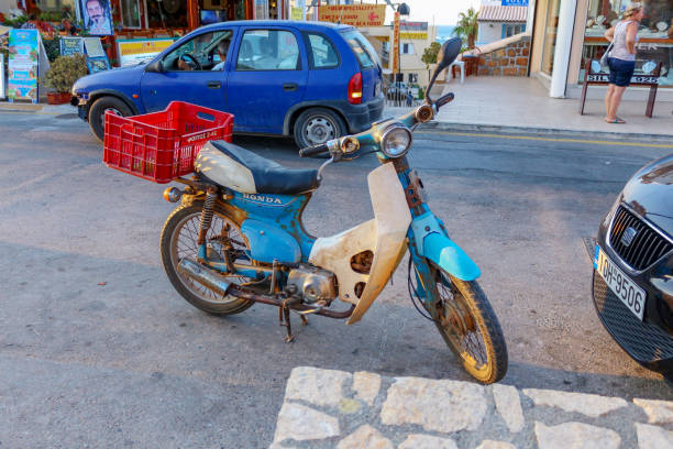 CRETE, GREECE - JULY, 30, 2016: old Honda motorcycle on the street of the island of Crete