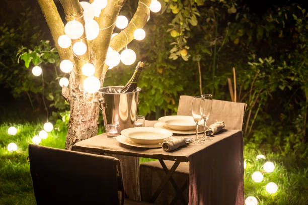 istock Illuminated table for two in the summer evening 1142556164