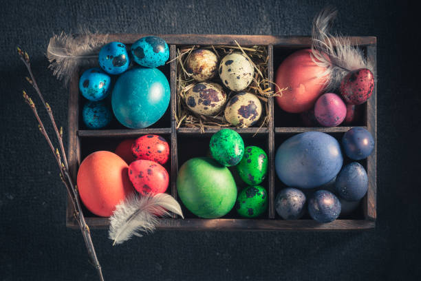 istock Top view of fresh Easter eggs in small wooden box 1142557238