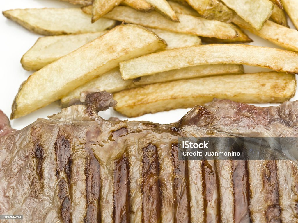 Bistec Nueva York y las papas fritas - Foto de stock de Alimento libre de derechos