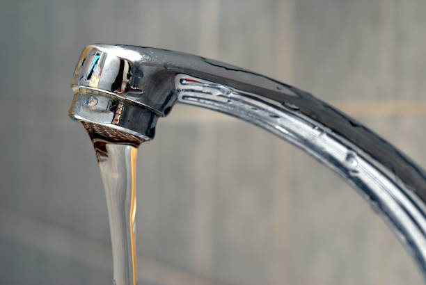 istock Water flowing from a faucet 1142557752
