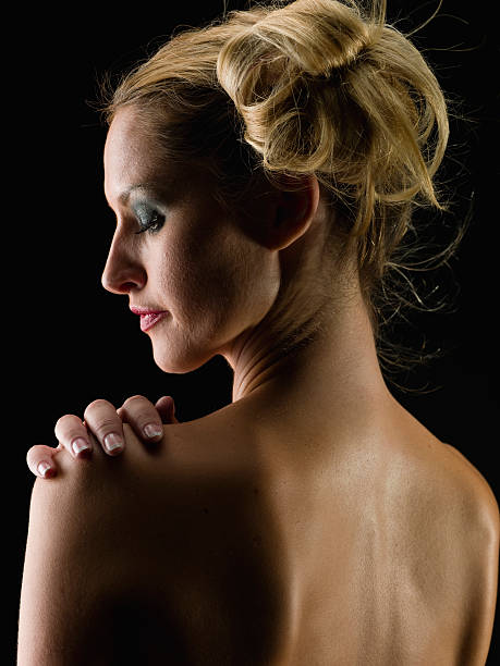 istock Beautiful woman holding her shoulder 114255939