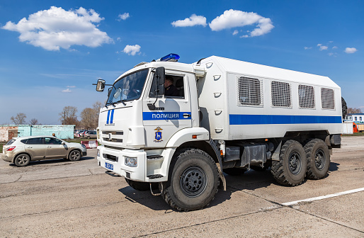 Samara, Russia - April 13, 2019: Russian police heavy truck on the city street in summer sunny day