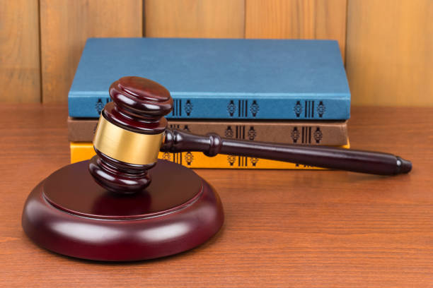 istock Wooden judge gavel and book 1142559446