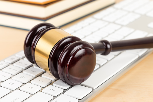 Wooden judge gavel and soundboard with keyboard