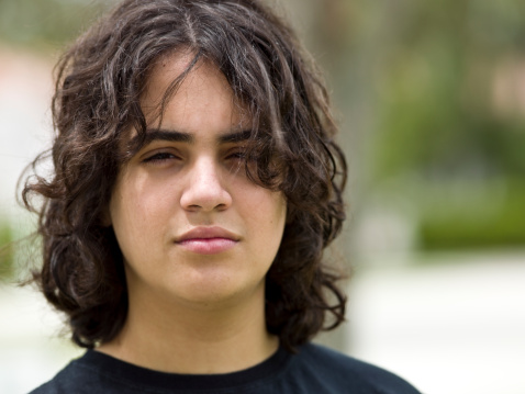 Hispanic Teenage Boy With Long Hair Stock Photo - Download Image Now -  Teenage Boys, Long Hair, Latin American and Hispanic Ethnicity - iStock