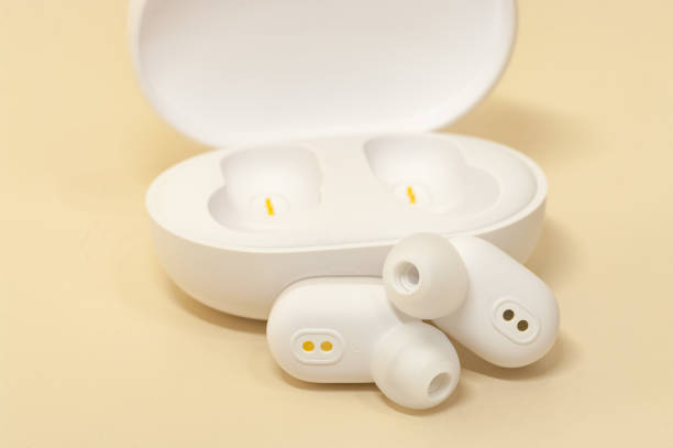istock White earphones with power box. 1142563695
