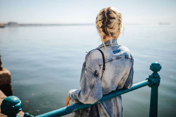 istock Relaxing walk by the sea 1142567305