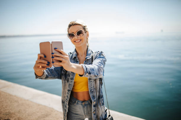 istock Selfie by the sea 1142567388