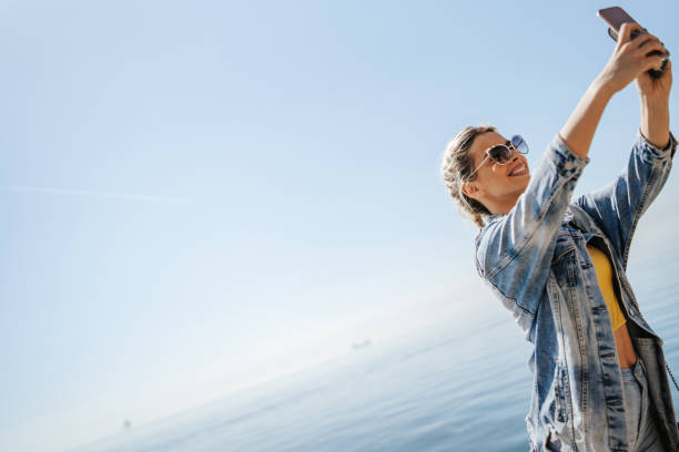 istock Selfie by the sea 1142567546