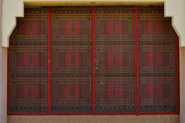 Vintage Saudi door with traditional design by red color