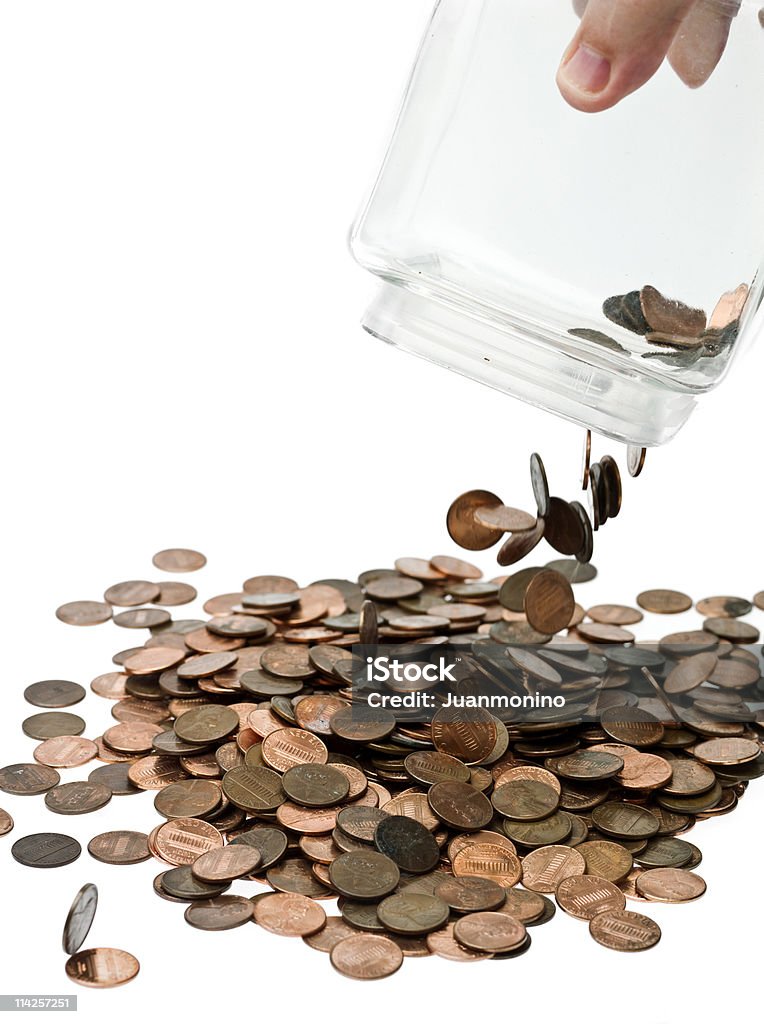 Last Resources Human hand poring all pennies out of its jar on white background  (this picture has been taken with a super high definition Hasselblad H3D II 31 megapixels camera) Abraham Lincoln Stock Photo