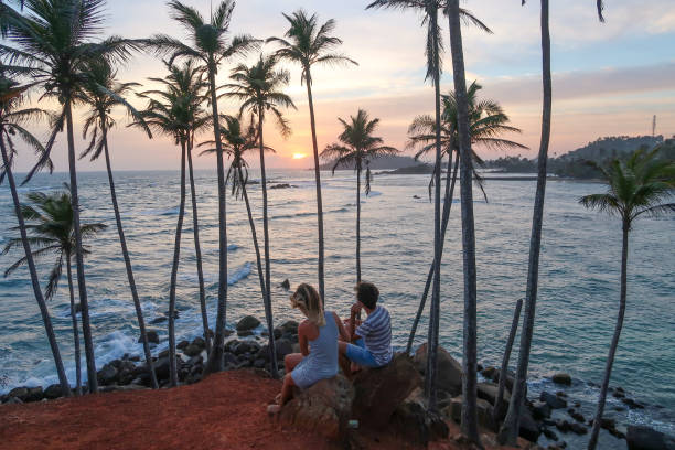 istock Sitting on a rock at sea beach 1142577125