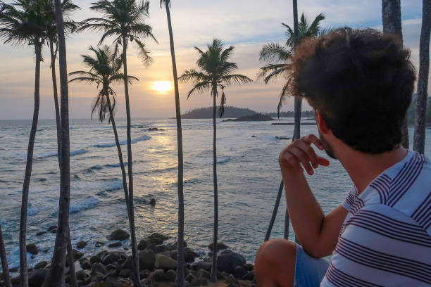 istock Enjoying the view of sea beach 1142577126