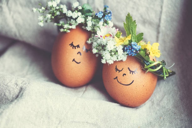 Easter Eggs, Plants and Flowers on Green Background