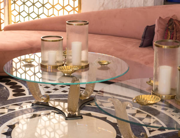 istock coffee glass table with decorative candles 1142584812