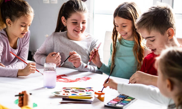 istock Children drawing with water colors. 1142586736