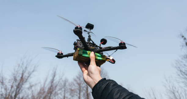 istock Man holds in his hand fpv copter 1142588451