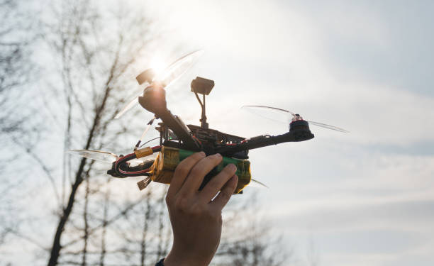 istock Man holds in his hand fpv copter 1142588704