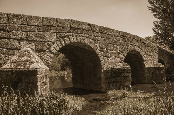 istock Old Roman stone bridge over the Sever River in Portagem 1142589809