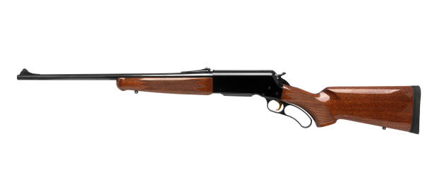 istock Old American wild west rifle isolated on white background 1142594143