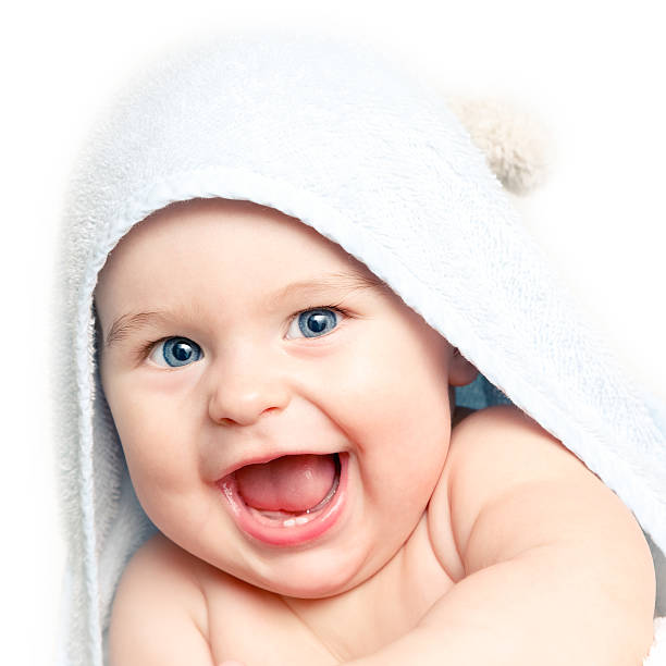 istock A cute little baby smiling under the towel 114259447