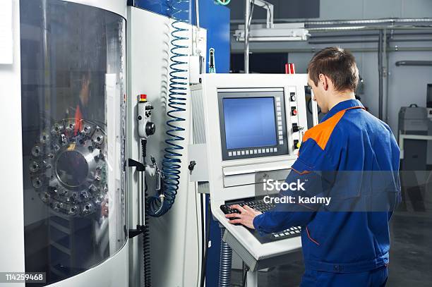 Worker Performing A Job At Tool Workshop Stock Photo - Download Image Now - Machinery, Manufacturing, Milling Machine